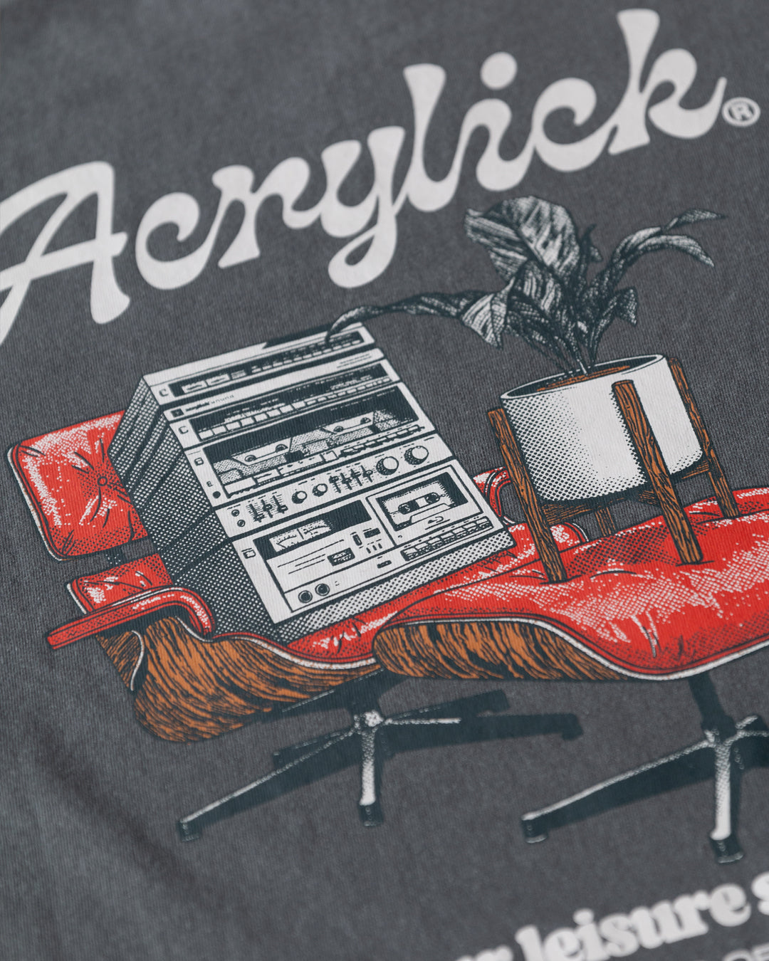 Mid-century style lounge chair holding a vintage hi-fi stereo, paired with a peace lily in a modern planter, representing relaxed listening and thoughtful living.