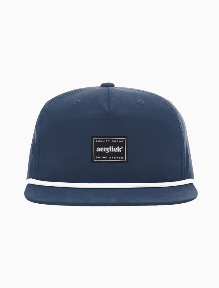 Navy snapback with rope on front bill with our Sound System woven label front center.