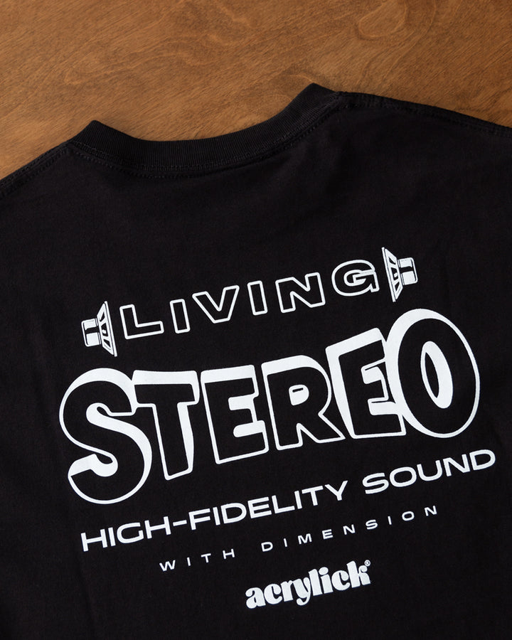 Side-view illustration of stereo speakers facing outward with the words “Living Stereo,” symbolizing immersive, high-fidelity sound with Acrylick logo.